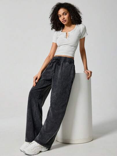 SHEIN EZwear كولوت أسود محبوك للنساء مع خصر قابل للشد، بتصميم فضفاض وعصري