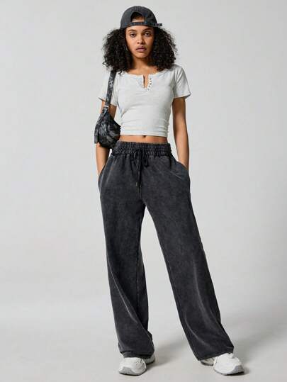 SHEIN EZwear كولوت أسود محبوك للنساء مع خصر قابل للشد، بتصميم فضفاض وعصري