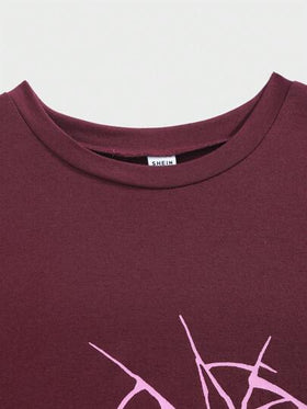 SHEIN ملابس علوية للمراهقين جرافيك مطبوع، قصير الأكمام، مريح وعملي