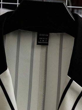 SHEIN LUNE بدلة متناسقة مكونة من جاكيت بلا أكمام ذو خصر ضيق مع شورت بخطوط ملونة