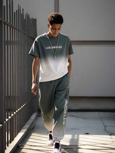 SHEIN بدلة كاجوال للصبي المراهق، قميص كم قصير بطراز الشارع وبنطلون رياضي للخارج، 2 قطع