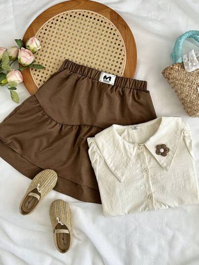 girls-sets Vintaside Kids طقم للبنات من قميص قصير الأكمام مناسب للصيف مع تنورة غربية عصرية وجذابة مثالي للموسم الصيفي. التصميم عملي وأنيق، يوفر الدفء والأناقة للخارج أو وقت الراحة في المنزل