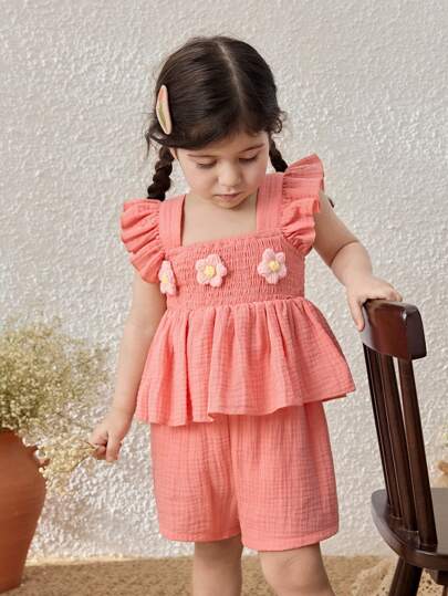 Blossori طقم ملابس علوية بأكمام كشكشة وشورت مزخرف بالأزهار، بنمط عطلة نسائي للأطفال البنات باللون الوردي