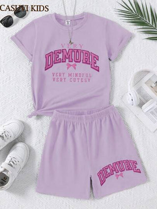 girls-sets 2 قطعة/طقم ملابس للبنات، بنطلون رياضي أسود قصير مع تيشيرت قصير الأكمام مزين بطبعات الأقواس والحروف الإنجليزية بشكل كرتوني، بسيط وراحة للفتيات الناشئات مناسب للارتداء اليومي خلال الربيع والصيف