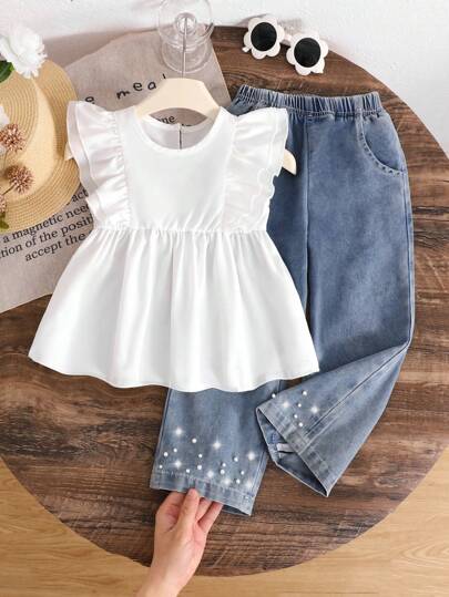 SHEIN Genkimix Kids مجموعة قميص كاجوال مكشكش بلا أكمام وبنطلون جينز مدبب عصري للبنات ،2 قطعة / طقم