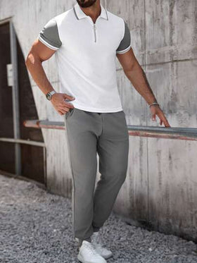 Manfinity CasualCool طقم بولو رجالي بأكمام قصيرة مزود بسحاب، وبنطال صلب اللون