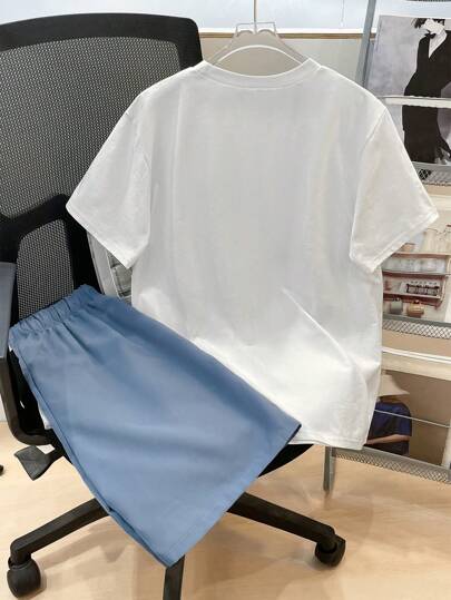 SHEIN مجموعة ملابس علوية كم قصير وشورت كاجوال للصبية 2 قطعة، بطراز وشارع، روك بنك، أسلوب مدرسي، مناسب لفصلي الربيع والصيف، حفلات، مهرجان موسيقى، طباعة الرسوم الإنجليزية والألوان الكتلية
