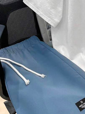 SHEIN مجموعة ملابس علوية كم قصير وشورت كاجوال للصبية 2 قطعة، بطراز وشارع، روك بنك، أسلوب مدرسي، مناسب لفصلي الربيع والصيف، حفلات، مهرجان موسيقى، طباعة الرسوم الإنجليزية والألوان الكتلية
