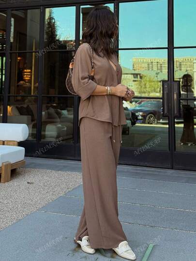 بدلة مكونة من سروال قماشي رياضي بخصر مطاطي مع قميص فضفاض سادة لارتداء اليومي، طقم اثنين قطع للنساء