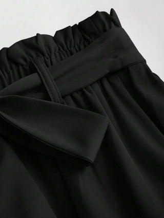Sweetra تنورة ماكسي طويلة كاجوال للنساء بخصر منقوش ومربوط بعقدة باللون الأحادي