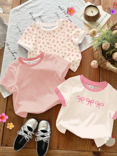 SHEIN مجموعة 3 قطع من تيشيرتات بناتية كاجوال وعملية ذات رقبة دائرية وأكمام قصيرة، تتميز بطبعات أزهار بوهيمية جميلة، خطوط باستيل ناعمة، وتصميمات فراشة ثلاثية الأبعاد، مناسبة للربيع والصيف للمنزل والعطلات والعودة إلى المدرسة