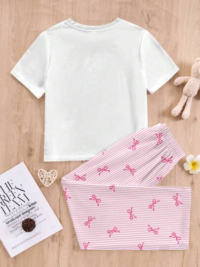 SHEIN 2 قطعة طقم بنات مراهقات ملابس نوم كاجوال - ملابس علوية أكمام قصيرة وسبعة وبنطلون، طبعة شريط زهري وفيونكة