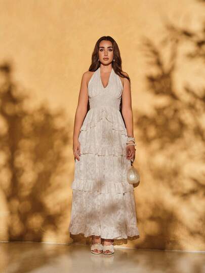 SHEIN X Hannahelzahed SHEIN MOD فستان برقبة حالتر مع فيونكة كبيرة وظهر مفتوح، بتصميم زهري مطرز، أناقة رومانسية حالمة بتطريزات مكشكشة، مناسب للمواعيد والحفلات والعطلات وحفلات الشاي وملابس أعياد الميلاد ، إطلالات صيفية للسيدات، إطلالات عيد الفصح ،إطلالات ال