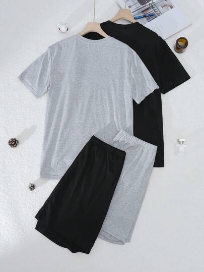 SHEIN طقم بيجاما للرجال بأعلى بأكمام قصيرة ياقة على شكل حرف V، وشورت بلون أحادي