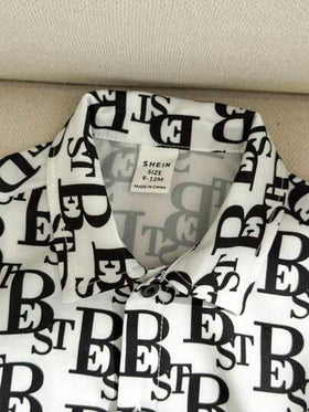 SHEIN Leap Crew مجموعة من 2 قطعة للأطفال الصبية/البنات - ملابس علوية بياقة بولو محبوكة وشورت بخصر مطاطي، بدلة كاجوال مناسبة للاستخدام الداخلي والخارجي في فصلي الربيع والصيف