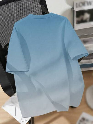 SHEIN تي شيرت صيفي أكمام قصيرة رقبة مستديرة بتصميم بسيط مناسب للأولاد في مرحلة ما بين الطفولة والمراهقة