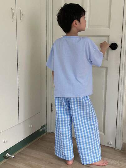 Dazy Kids مجموعة كاجوال لأطفال المراهقين الصبية، تتكون من 2 قطعة: بلوزة قصيرة الأكمام بلون سادة + بنطلون طويل مخطط منسوج، مناسبة للربيع والصيف