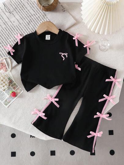 SHEIN مجموعة من 2 قطع للبنات الصغيرات: بلوزة كورية عصرية مخططة بأكمام قصيرة مزينة بفيونكة + بنطلون أرجل واسع مرتفع الخصر كاجوال طويل، لفصل الصيف