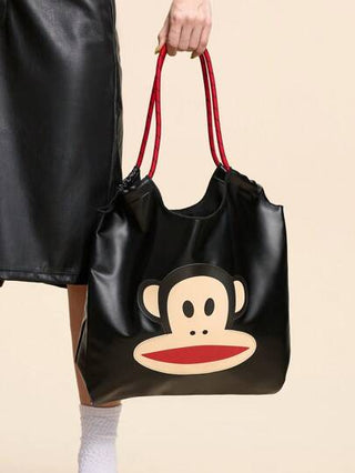 Paul Frank X  1 قطعة حقيبة كتف زخرفية بطباعة جلد PU بنمط كرتوني، مناسبة للرجال والنساء والمراهقين والطلاب، مناسبة للتنقل والسفر والخروج والتسوق، تستوعب أجهزة الكمبيوتر المحمول 16 بوصة والكتب والمحافظ وأكواب المياه، قرد، وأنيقة