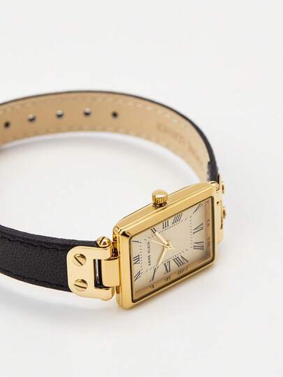 Anne Klein ساعة كوارتز بسوار جلد أسود للنساء، قرص نسيجي كريمي، حالة بلون ذهبي، أنيقة وعصرية، مناسبة كهدية للسيدات، AK/3752CRBK