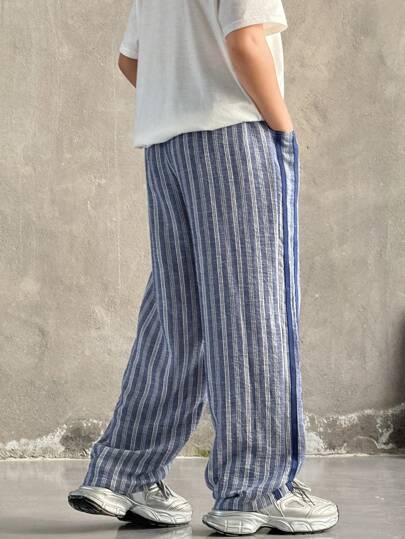 SHEIN بنطلون صبيان المراهقين المرن المريح متعدد الألوان مزين بشريط معلق مكتوب عليه بشكل منسوج، فضفاض مستقيم ذو لون واحد، مناسب للتنقل والمدرسة واليومي والعطلات والرياضة، ملائم للربيع والصيف والخريف والشتاء
