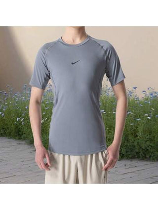 Nike تي شيرت AS M NP DF TIGHT TOP SS للرجال، ملابس رياضية للجري واللياقة البدنية والتدريب، تي شيرت مريح بأكمام قصيرة FB7933-084