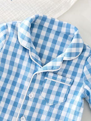 SHEIN رومبير نوم راحة طفل حديث الولادة بولد ذات طبعة شكل المربعات مع أزرار في طوق الرقبة، أكمام طويلة وجيب وبنطال محبوك ناعم وصديق للبشرة