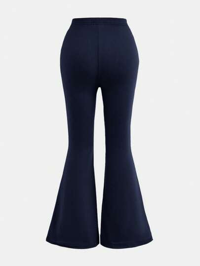 SHEIN Girlism طقم قميص كاجوال بأكمام قصيرة فضفاضة مطبوع عليه حرف وبنطلون واسع للفتيات المراهقات، قطعتان