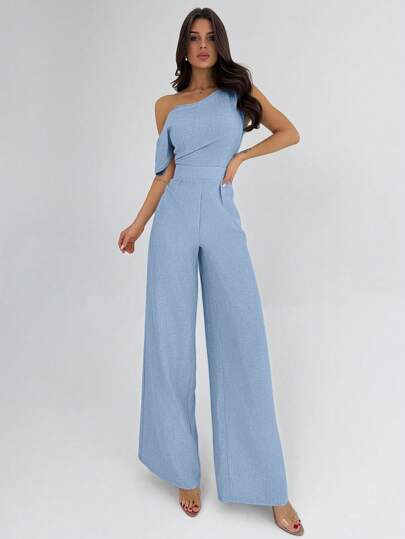 Firerie بدلة كاملة من قماش الكتان والقماش المحبوك في لون بيج، بخصر مشدود وأكمام غير متماثلة وظهر مكشوف، مناسبة للاستخدام في المناسبات والعطلات والسفر إلى الشاطئ، بتصميم أنيق وبسيط