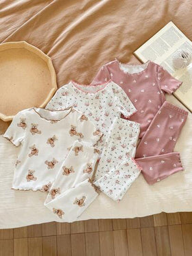 SHEIN LMoss Kids طقم بيجاما للأطفال البنات 6 قطع، مطبوع برسوم الدبي الكارتوني الجميل والزهور، تصميم قصير الأكمام وبنطال مع كشكشة، قطن مريح ومحبك للاستخدام اليومي