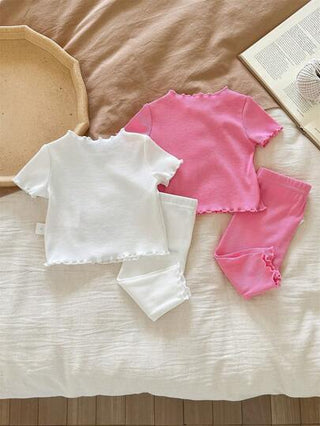 SHEIN طقم بيجامة كاجوال مريح مكون من 4 قطع لحديثي الولادة: توب بأكمام قصيرة وطقم بنطلون طويل من النسيج المحبوك مع فيونكة وخطوط على الهيم، مناسب للفتيات الحديثي الولادة
