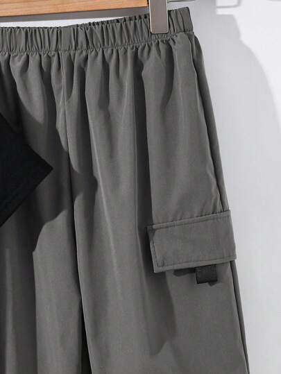 SHEIN مجموعة قميص كاجوال مريح بطبعة حرفية وبنطال كارجو بخصر مطاطي مناسب للمراهقين ذو مظهر أنيق وعملي متعدد الاستخدامات، مناسب للخريف والربيع والصيف، مثالي للارتداء اليومي والألعاب الخارجية والمدرسة والحفلات