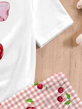SHEIN طقم ملابس نوم مكون من 2 قطعة لفتيات المراهقات: 1. بلوزة تي شيرت قصيرة الأكمام بياقة مستديرة بنمط عقدة الفراشة بسيط وكرز 2. بنطال بيجاما فضفاض بخصر مستقيم مع طبعة مربعات الكرز، مجموعة ملابس نوم كاجوال