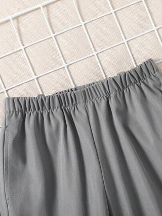 SHEIN زوج قطعة واحدة من بنطلونات الأولاد الفضفاضة الفضفاضة ذات اللون المتباين للاستخدام اليومي، المدرسة، الراحة، الموضة ، البساطة ، العملية ، المتعددة الاستخدامات ، اللينة ، المسترخية ، مناسبة للمدرسة ، اليومي، السفر ، الرياضة ، جميع المواسم