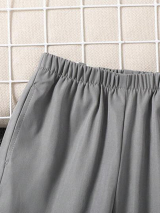 SHEIN زوج قطعة واحدة من بنطلونات الأولاد الفضفاضة الفضفاضة ذات اللون المتباين للاستخدام اليومي، المدرسة، الراحة، الموضة ، البساطة ، العملية ، المتعددة الاستخدامات ، اللينة ، المسترخية ، مناسبة للمدرسة ، اليومي، السفر ، الرياضة ، جميع المواسم