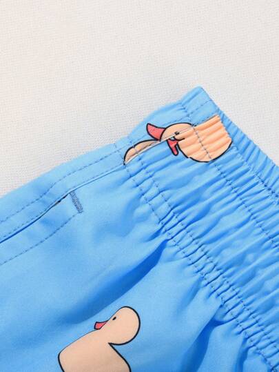 Manfinity Swimmode صندوره رجالية صيفية قصيرة مع جيوب، ذات خصر رباط مطبوع بطباعة البط