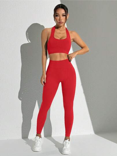 SHEIN Sport Studio بدلة رياضية لملابس النساء تتكون من سترة علوية ذات ظهر مكشوف وياقة حول العنق، وسروال ضيق