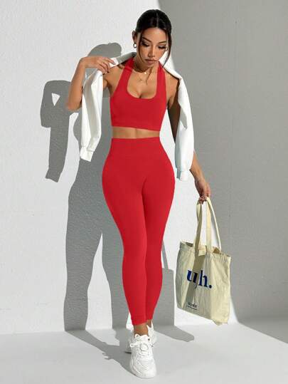 SHEIN Sport Studio بدلة رياضية لملابس النساء تتكون من سترة علوية ذات ظهر مكشوف وياقة حول العنق، وسروال ضيق