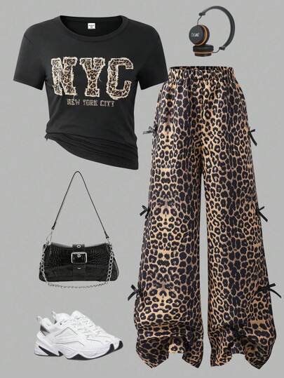 SHEIN Explorewe طقم فضفاض من ملابس علوية وبنطلون للبنات بنقشة نمر والفتيات وشريطة وقطع بصور حروف، مكون من قطعتين