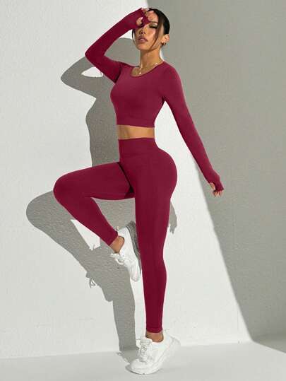 SHEIN Sport Studio بدلة رياضية للسيدات من شورت وتي شيرت طويل الأكمام قصير بظهر متقاطع، لون أحادي