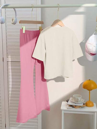 girls-sets طقم بنطلون قصير وتيشرت برسومات فتاة مراهقة مع فيونكة حلوة و طبعة الكرز، باللون الوردي، مناسب للصيف