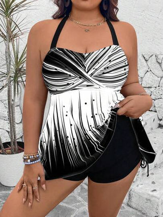 Swim Lushoire الحجم الكبير مجموعة من 2 قطع: ملابس علوية مطبوعة وشورت ذو خصر مرتفع باللون الأحادي مع خيط جانبي، خصر ملابس علوية عالي مفتوح الظهر بأربطة رفيعة متقاطعة، بدلة سباحة بأسلوب كاجوال