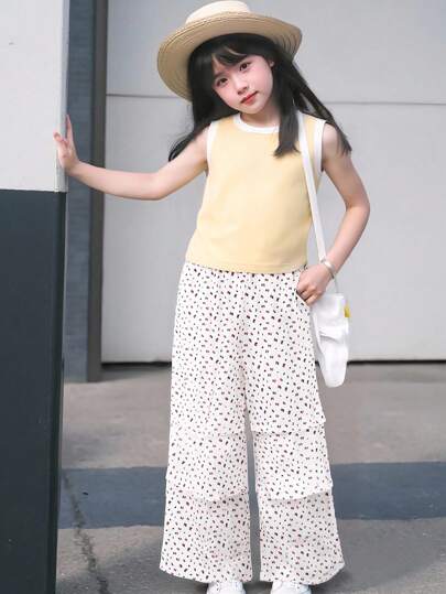 girls-sets Genkimix Kids طقم كاجوال للبنات: ملابس علوية قصيرة كروب بياقة مستديرة بدون أكمام وبنطلون فضفاض بخصر مطاطي وطبعات أزهار متناثرة باللون الأصفر الفاتح 2 قطعة