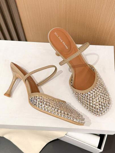 Xin Jing Shoes أحذية نسائية أنيقة ذات كعب عالي، كاجوال وجذاب بتصميم عصري، برؤوس مستديرة مرصعة بالراين ستون وظهر مفرغ، كعب متوسط مناسب للتنقل والمواعدة