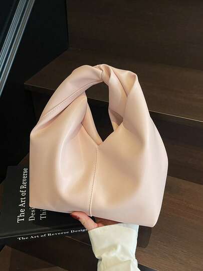 حقيبة يد مكتبية وللتنقلات، من جلد البولي يوريثان اللين المجعد باللون الوردي الفاتح، بتصميم بسيط وأنيق
