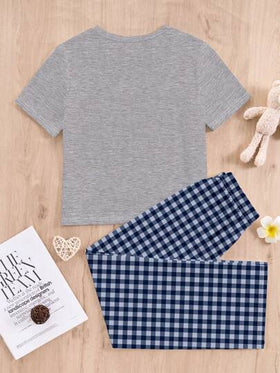 SHEIN بيجاما مكونة من ملابس علوية قصيرة الأكمام وبنطال بتصميم كاجوال مطبوع عليه رسوم قطط محببة بياقة مستديرة وقطعة موسمية مناسبة للمراهقات في الربيع والصيف
