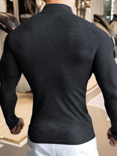 Manfinity Sport PWRUP قميص رياضي لليد ذو رقبة عالية وسستة أمامية، أكمام رجلان وألوان سادة، ملابس تمرين، تيشرتات وبلوزات الجري
