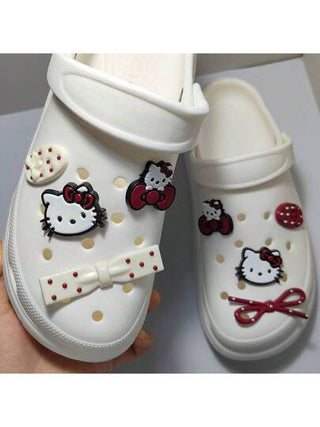 Sanrio 8 قطع شارم أحذية هالو كيتي من سانريو ديكورات كرتونية بشكل فريد، عقدة الفراشة وقطرات ماء، مناسبة لحذاء الكلوق والصنادل، تزيين الأحذية للأطفال والبالغين والفتيات والنساء، هدايا عيد الميلاد