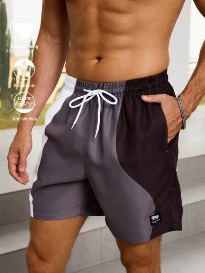 Manfinity Swimmode شورت رجالي قصير بجيب ذو خصر سحاب، مناسب لموسم الصيف