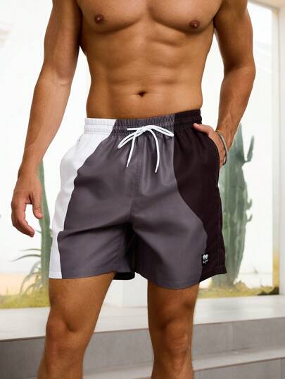 Manfinity Swimmode شورت رجالي قصير بجيب ذو خصر سحاب، مناسب لموسم الصيف